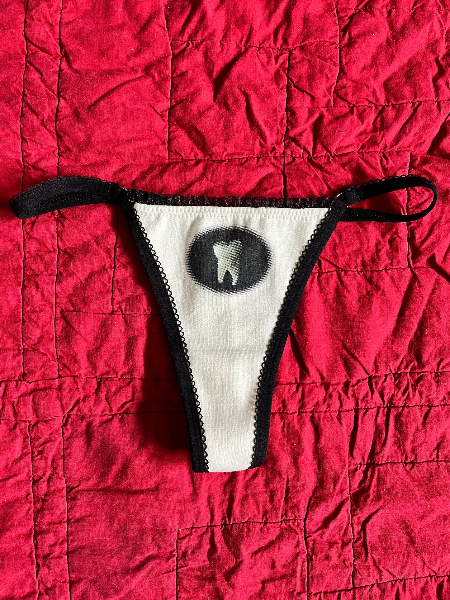 S TOOTH THONG