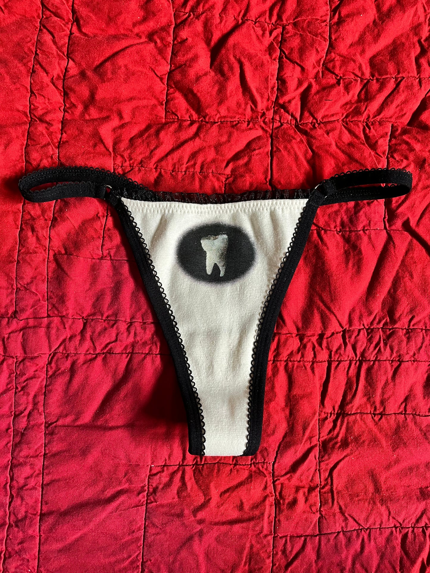 S TOOTH THONG
