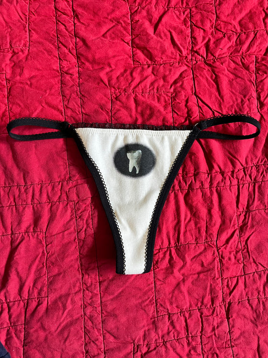 M TOOTH THONG