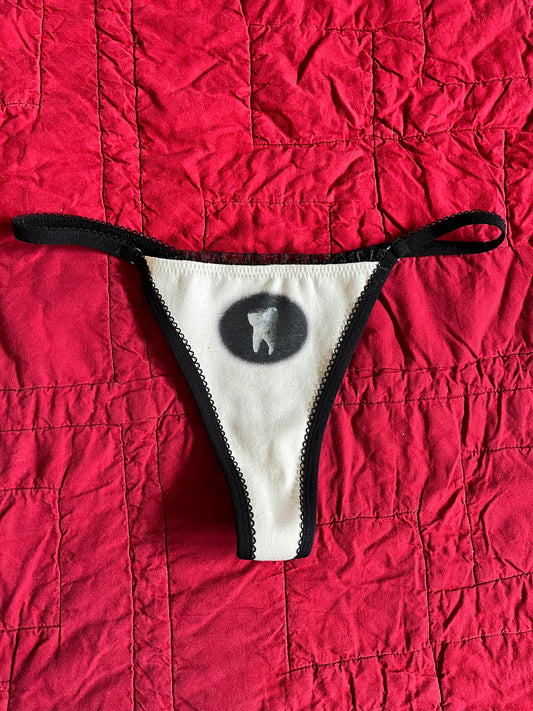 M TOOTH THONG