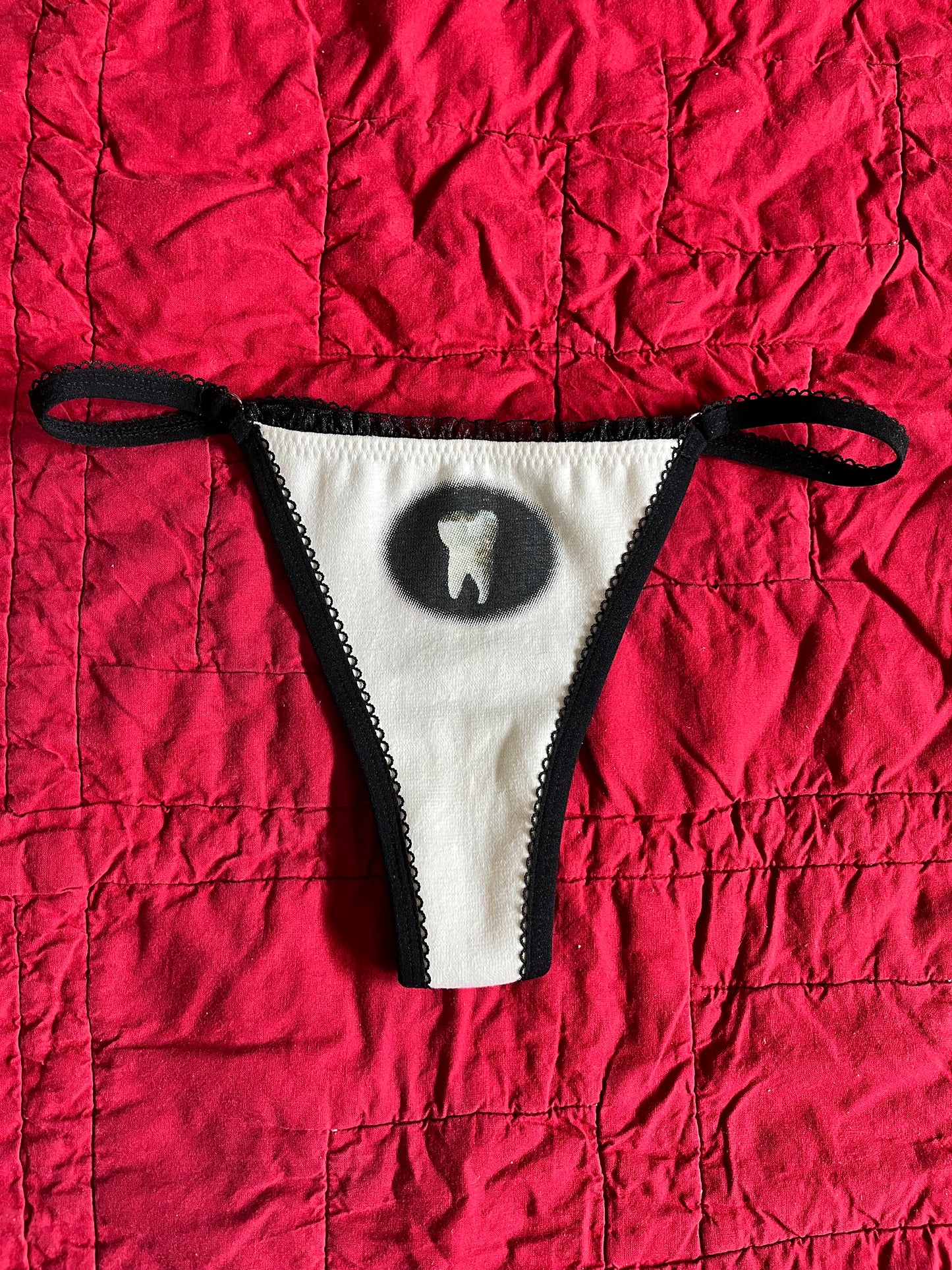 S TOOTH THONG