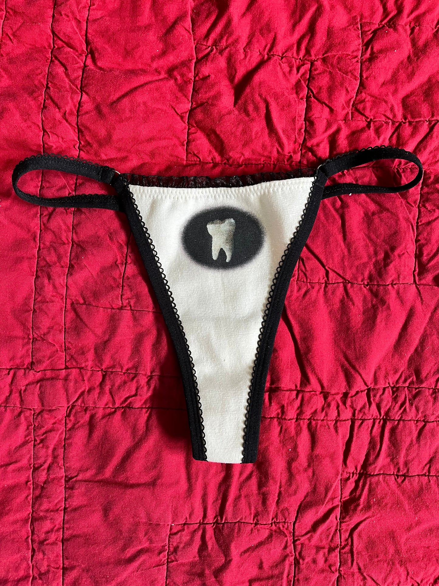 S TOOTH THONG